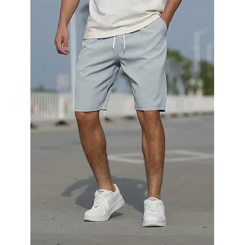 Men's high-waist pull-on shorts. Close-up of breathable fabric. Casual comfort, relaxed fit.