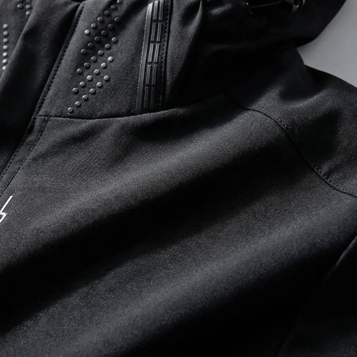 Stylish men's spring jacket with hood, lightweight & water repellent for outdoor wear.