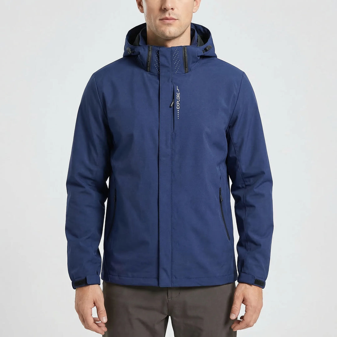 Comfortable men's softshell windbreaker with hood, essential lightweight outdoor gear for spring.
