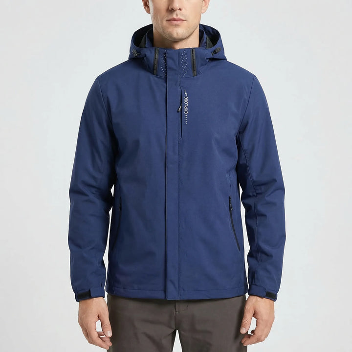 Comfortable men's softshell windbreaker with hood, essential lightweight outdoor gear for spring.