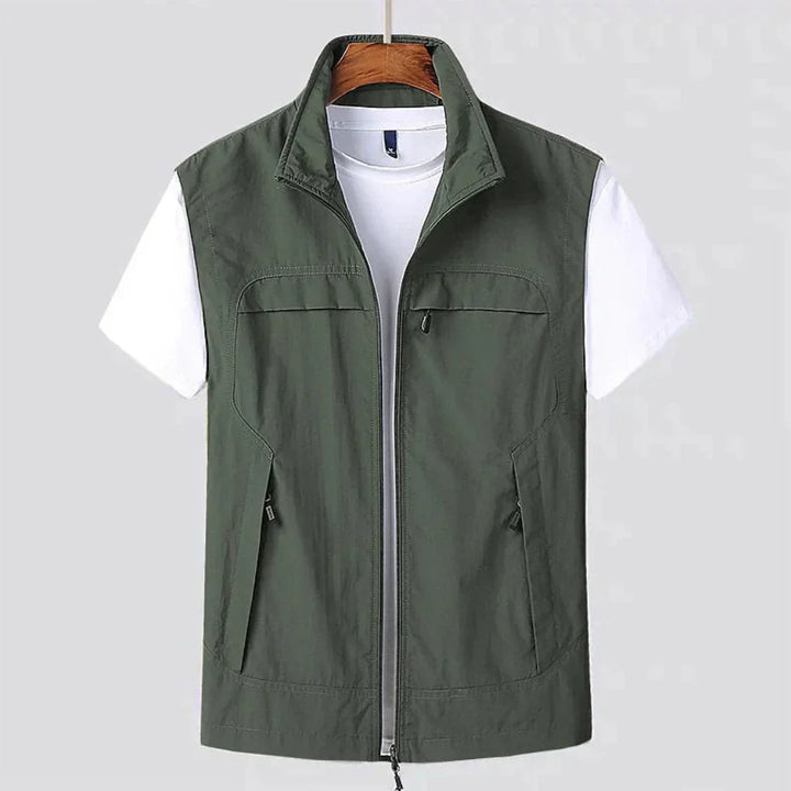 Durable men's lightweight outdoor vest with full zip. Quick-dry for hiking & travel. Flexible, multi-pocket design.