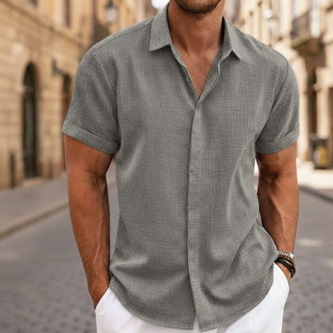 Stylish men's lightweight short sleeve button-up shirt. Great casual polo for warm weather and summer fashion.