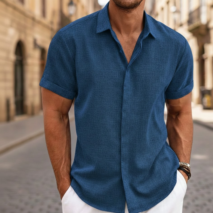 Soft, lightweight men's short sleeve polo shirt with buttons. Essential casual wear for summer and warm climates.