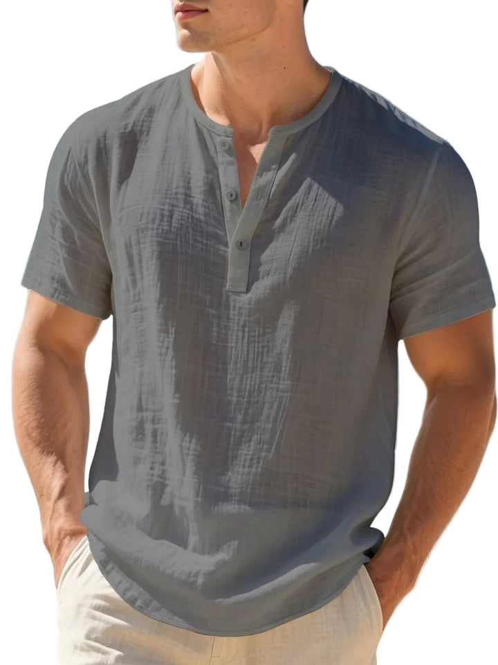 Beachwear ready: men's lightweight short-sleeve Henley shirt for ultimate summer comfort.