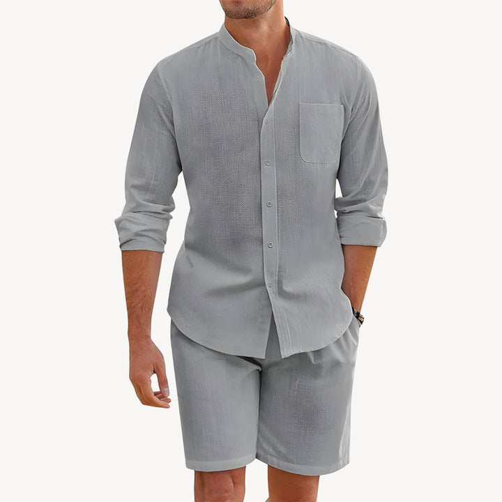 Stylish men's two-piece summer set. Short-sleeve button shirt & comfy drawstring shorts. Great for men's fashion.