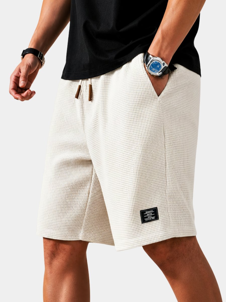 Men's lightweight summer shorts with drawstring waist, perfect for casual comfort & warm weather.