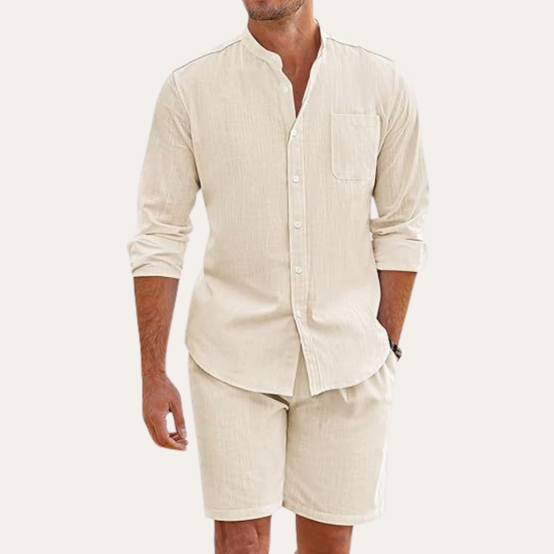 Complete men's summer look: a lightweight long sleeve shirt paired with matching shorts. Ideal for beach or casual outfits.