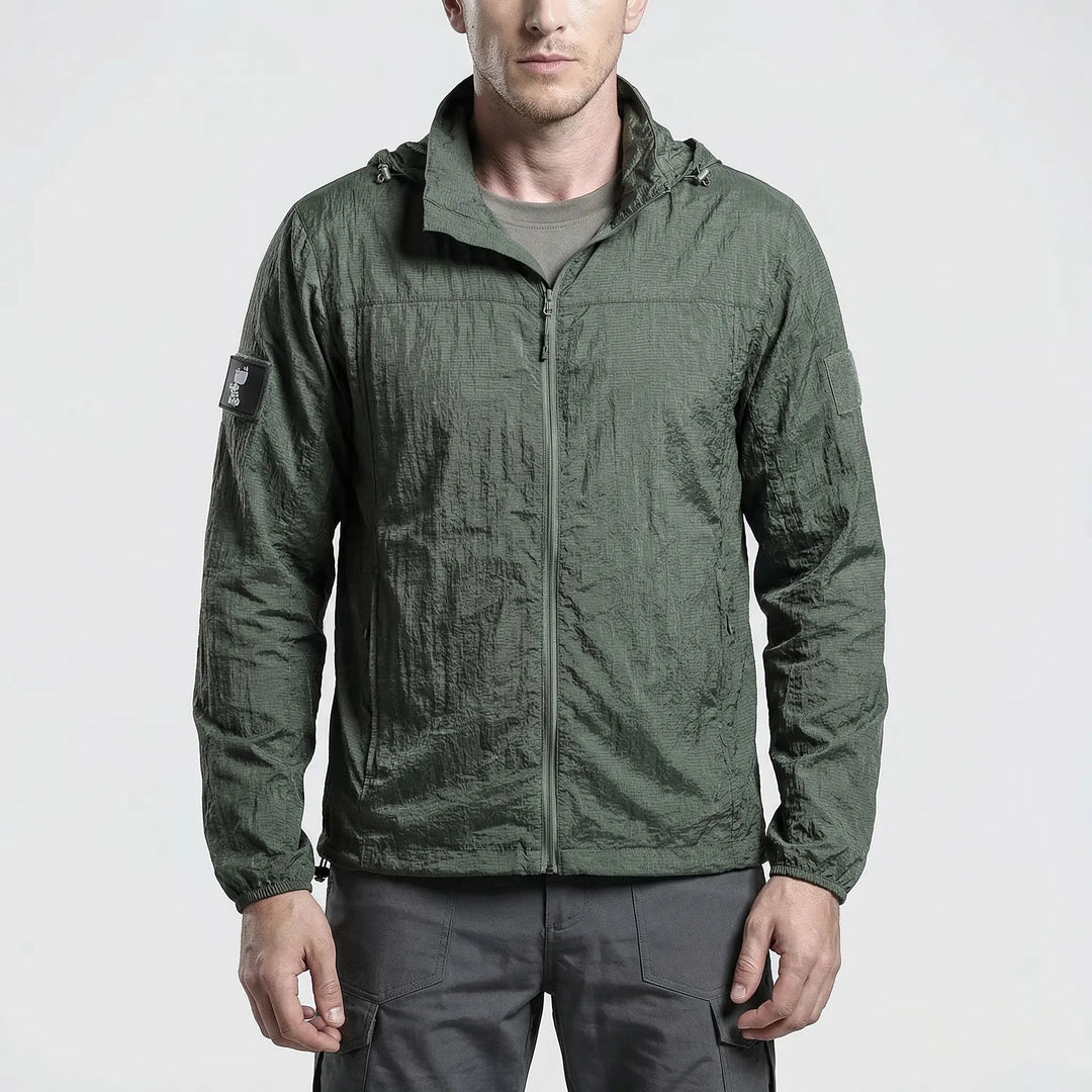Hooded men's tactical windbreaker jacket, lightweight and quick-dry, perfect for hiking and outdoor activities.