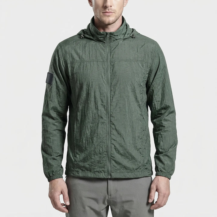 Compact, lightweight men's tactical windbreaker jacket with hood, essential quick-dry gear for travel & hiking.