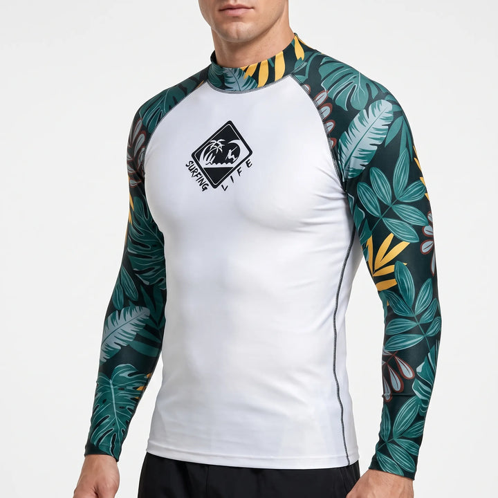 Man surfing waves, wearing a long-sleeve UPF 50+ performance rash guard for sun and rash protection.