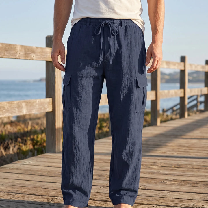 Men's loose straight leg cargo pants in a neutral color, ideal for casual comfort and everyday wear.