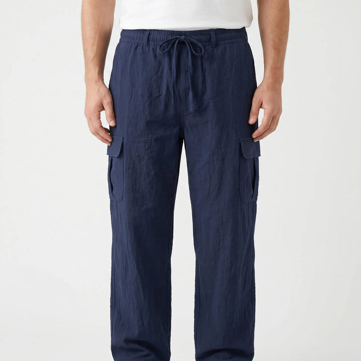 Casual men's loose fit cargo pants with practical utility pockets and a comfortable drawstring waist.