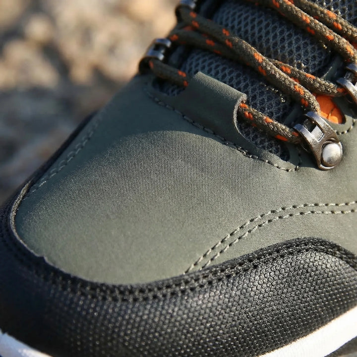 Durable men's low-cut waterproof hiking shoes with slip-resistant grip for comfort on any outdoor trail.