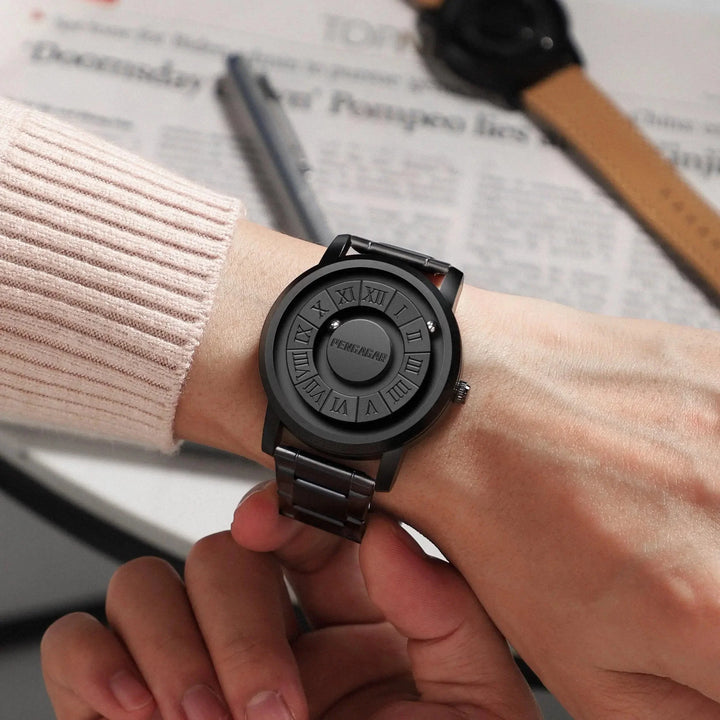 Close-up of a unique men's magnetic sphere watch, highlighting its innovative time-telling design.