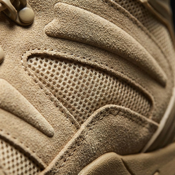 Comfortable men's lace-up hiking boots, mid-cut design offering ankle support for long outdoor adventures.