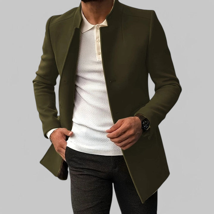 Men's minimalist button trench coat, tailored for smart casual winter style and cold weather.