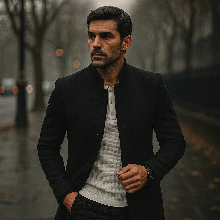 Button-front men's minimalist winter coat, an elegant smart casual choice for cold weather style.