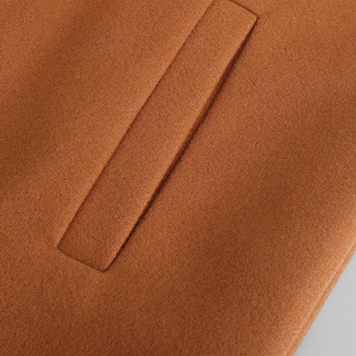 Elegant men's cold weather winter coat, minimalist button style for smart casual autumn outerwear.