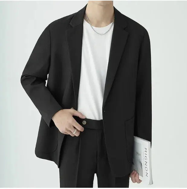 Two-piece men's suit set with tailored jacket & trousers, suitable for business, special occasions & formal wear.