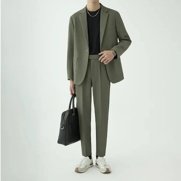 Sleek, modern minimalist men's suit, offering a sophisticated tailored fit for formal & smart casual events.