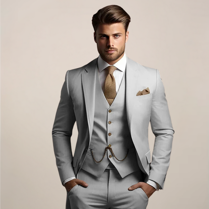 Close-up of a men's tailored slim-fit suit, featuring a modern three-piece design for a sophisticated style.