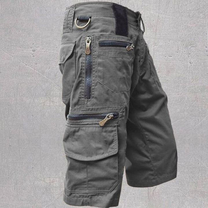 Comfortable men's cargo shorts for active everyday wear. Features multiple pockets & adjustable waist for summer casual.