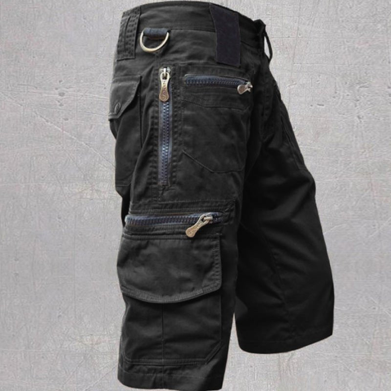 Rugged men's multi-pocket cargo shorts, perfect for hiking, camping, or casual summer outings. Durable & practical.