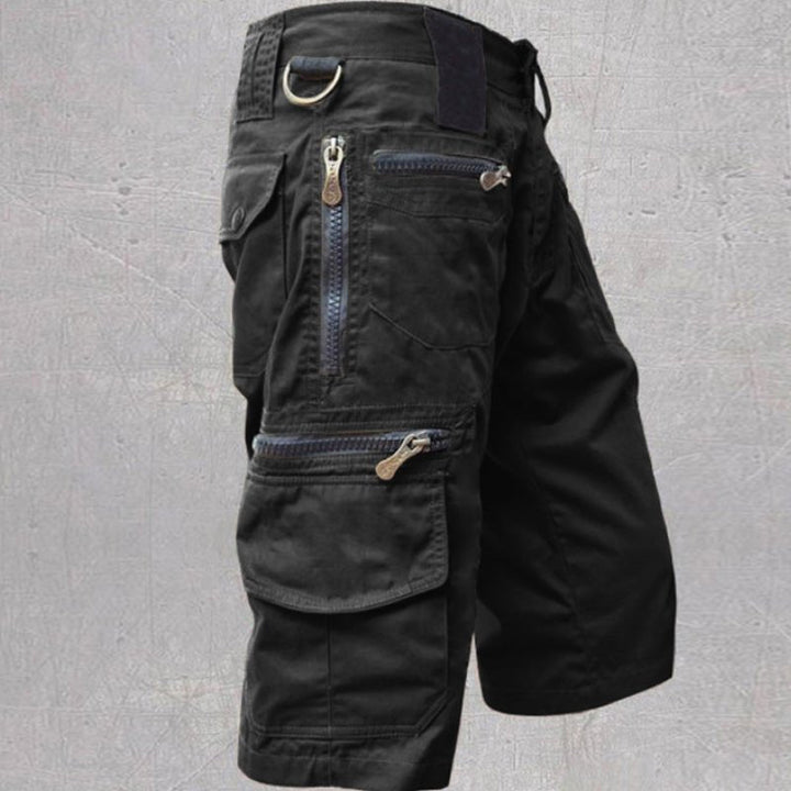 Rugged men's multi-pocket cargo shorts, perfect for hiking, camping, or casual summer outings. Durable & practical.