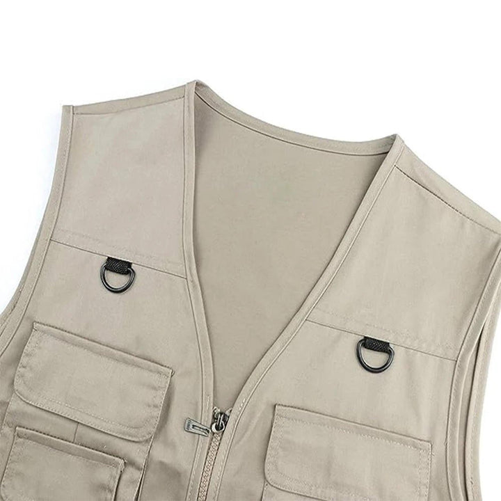 Travel-ready men's outdoor vest for photography & exploration. Features ample pockets for gear & convenient access.