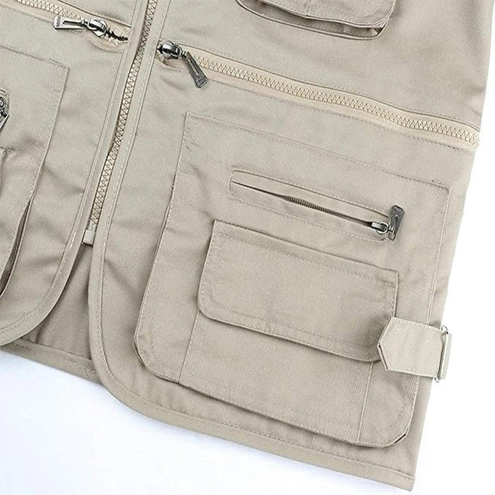 Sleeveless men's camping vest, a rugged bodywarmer for cool evenings. Multi-pocket design for camping essentials.