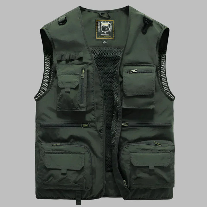 Functional men's sleeveless vest with numerous pockets, great for photography, work, or carrying essentials outdoors.