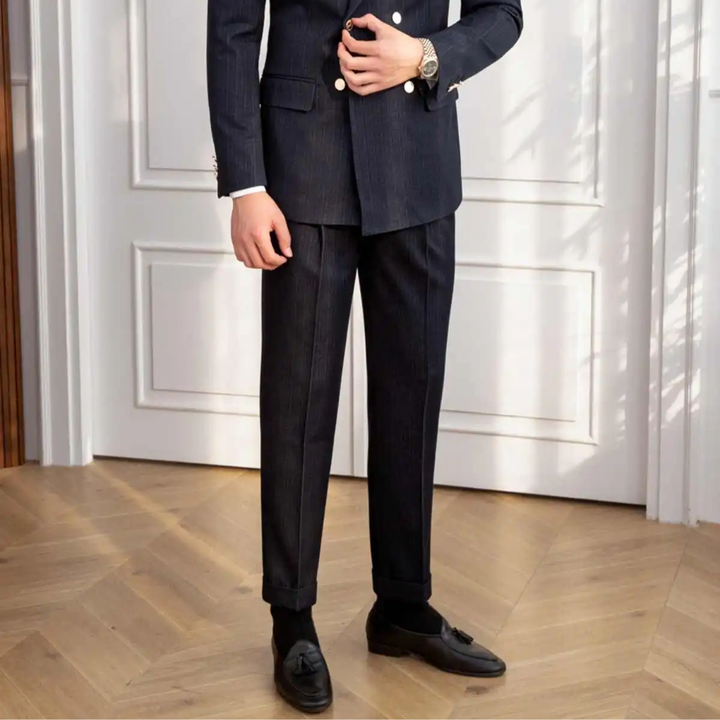Stylish men's navy blue slim fit double-breasted suit. Perfect tailored formal wear for business, weddings, or events.