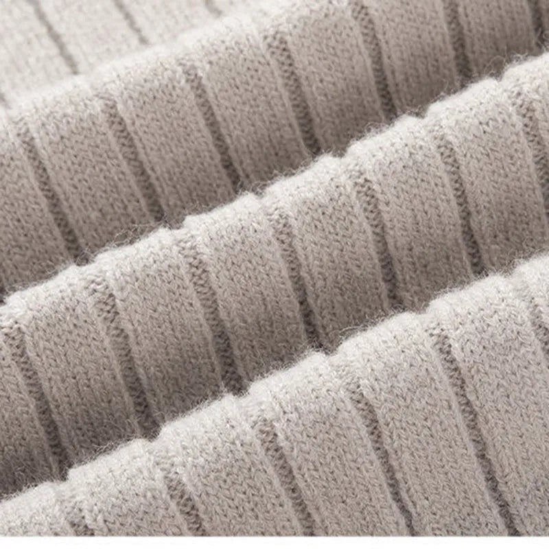 Versatile men's ribbed half-zip sweater, a stylish and comfortable layering piece for modern wear.