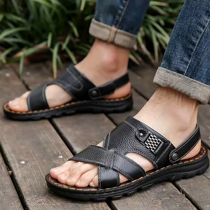 Close-up of men's orthopedic sandals, highlighting contoured arch support for superior comfort.