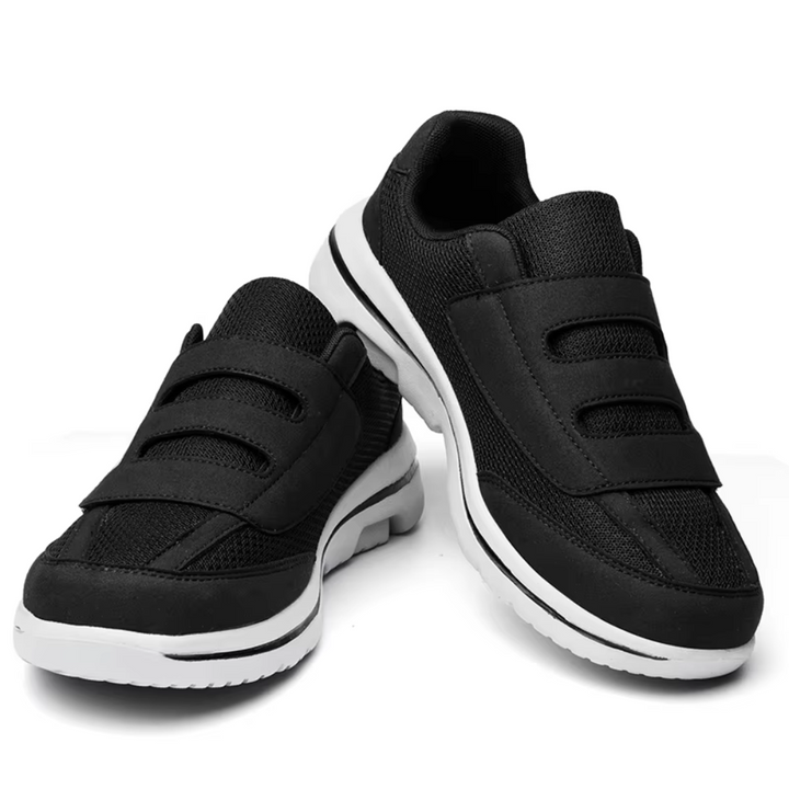 Black men's orthopedic shoes with breathable mesh panels and easy-adjust Velcro for superior comfort.
