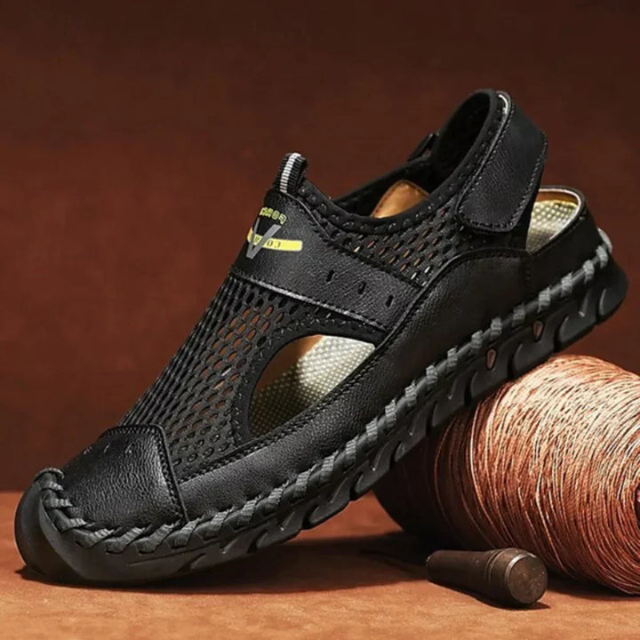 Adjustable men's orthopedic sport sandals. Breathable design with arch support for active comfort footwear.