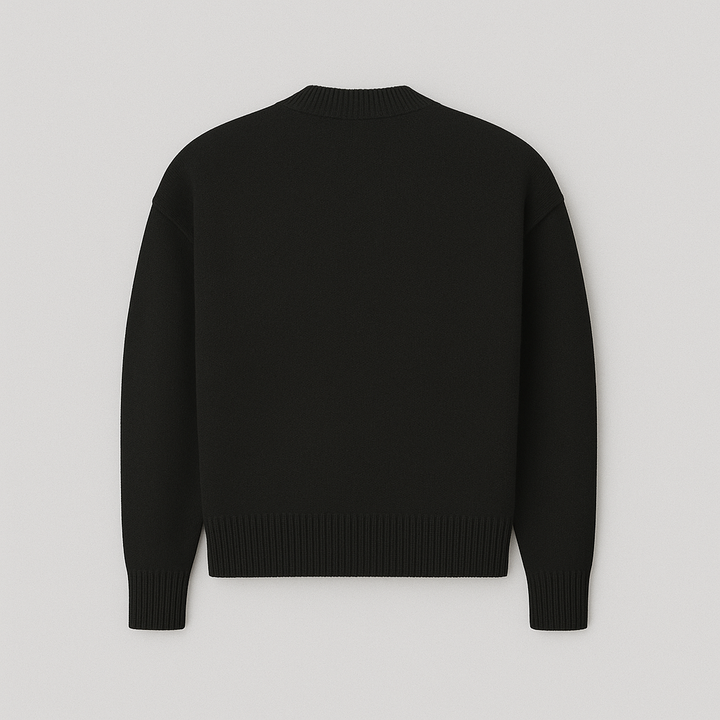 Stylish men's oversized sweater with a bold heart motif, perfect for expressing unique casual style.