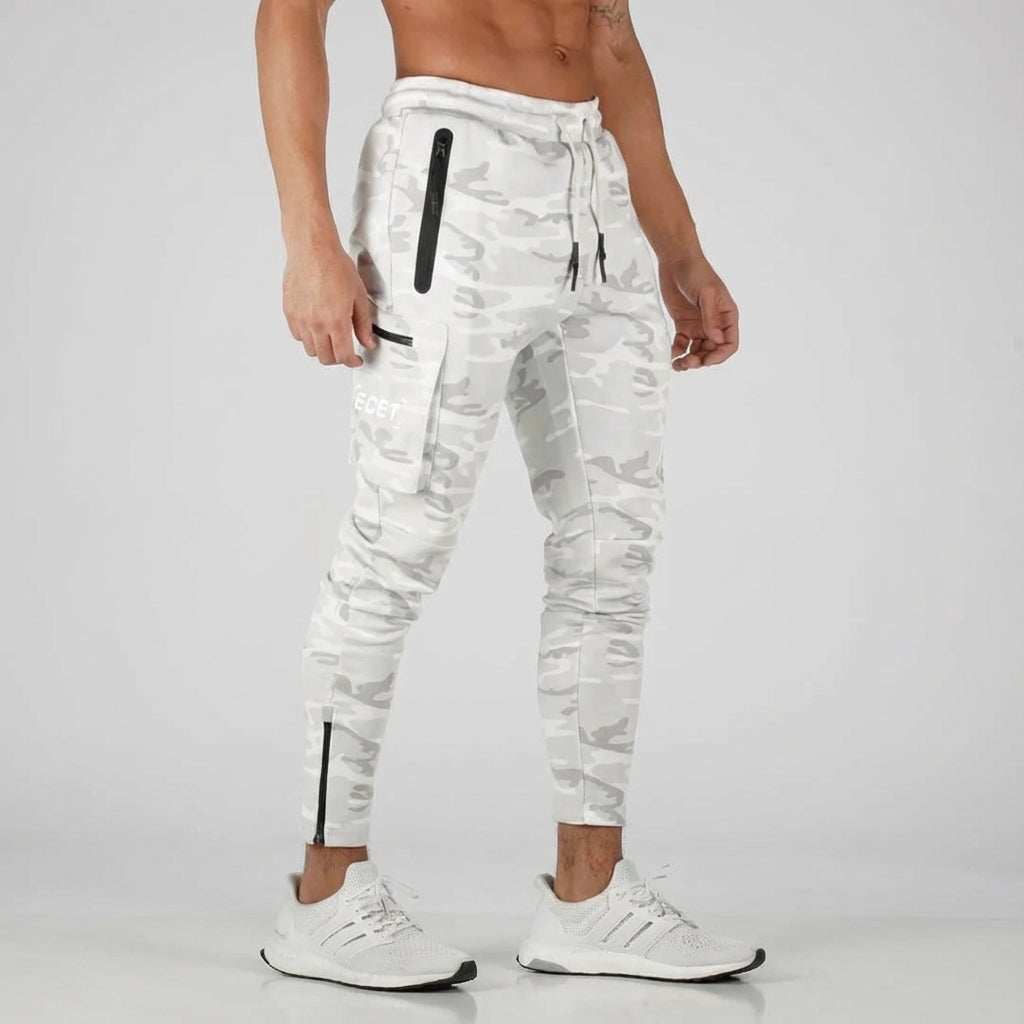 Comfortable men's activewear joggers in dark grey, featuring a drawstring waist & secure pockets for training.
