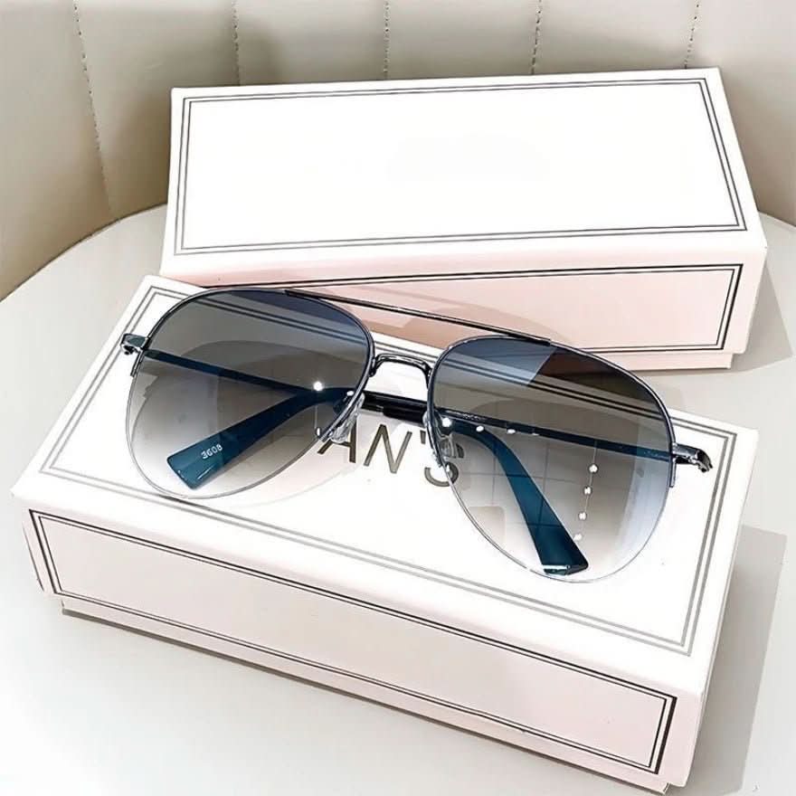 Fashionable men's pilot sunglasses with gradient lenses, UV400 eye protection, and outdoor style.