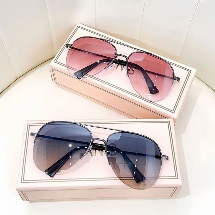Front view of men's pilot sunglasses featuring gradient lenses and UV400 eye protection.