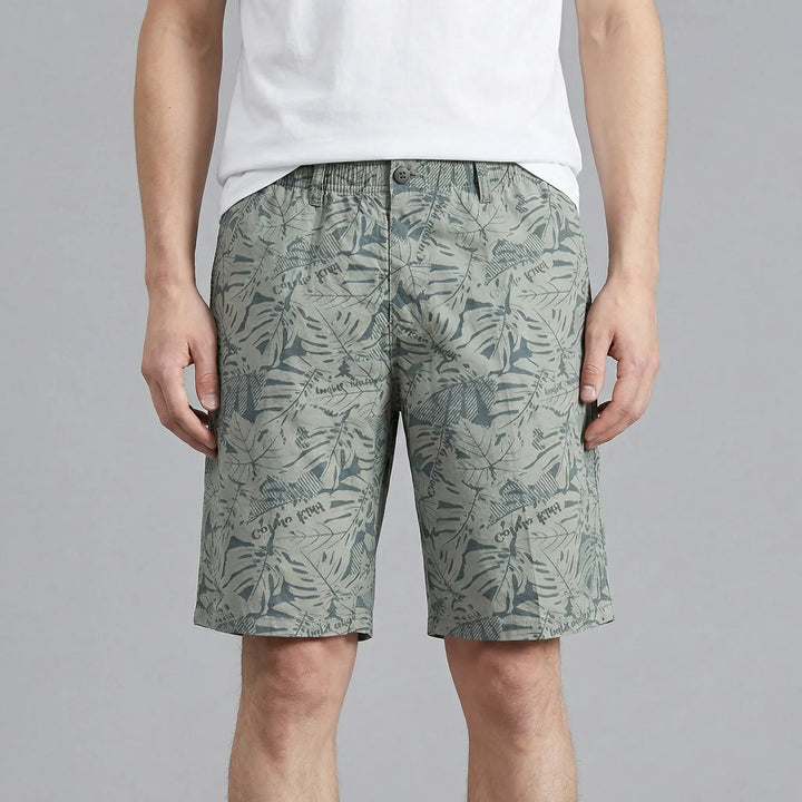 Plus size men's knee-length shorts, breathable for summer. Casual streetwear with an elastic waist & relaxed fit.