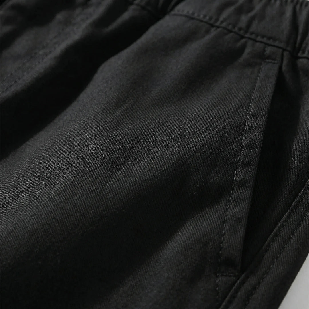 Big & Tall men's knee-length shorts: breathable, elastic waist, relaxed fit. Ideal for everyday casual style.