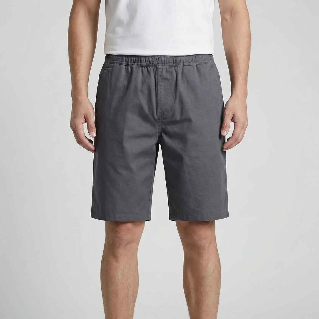 Relaxed fit plus size men's shorts. Knee-length, comfortable, with elastic waist for casual and summer wear.