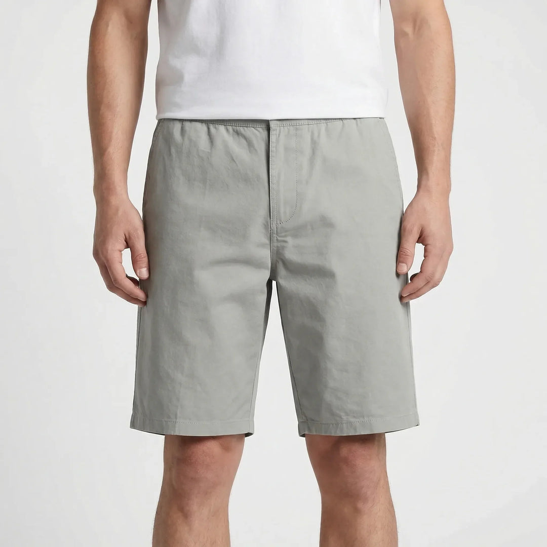 Stylish big & tall men's knee-length shorts. Casual streetwear look with relaxed fit & elastic waist comfort.