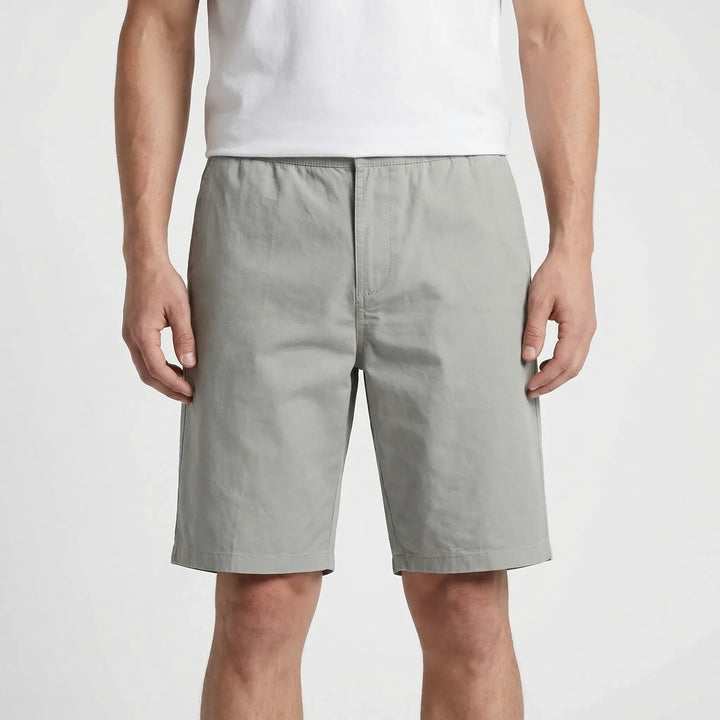 Stylish big & tall men's knee-length shorts. Casual streetwear look with relaxed fit & elastic waist comfort.