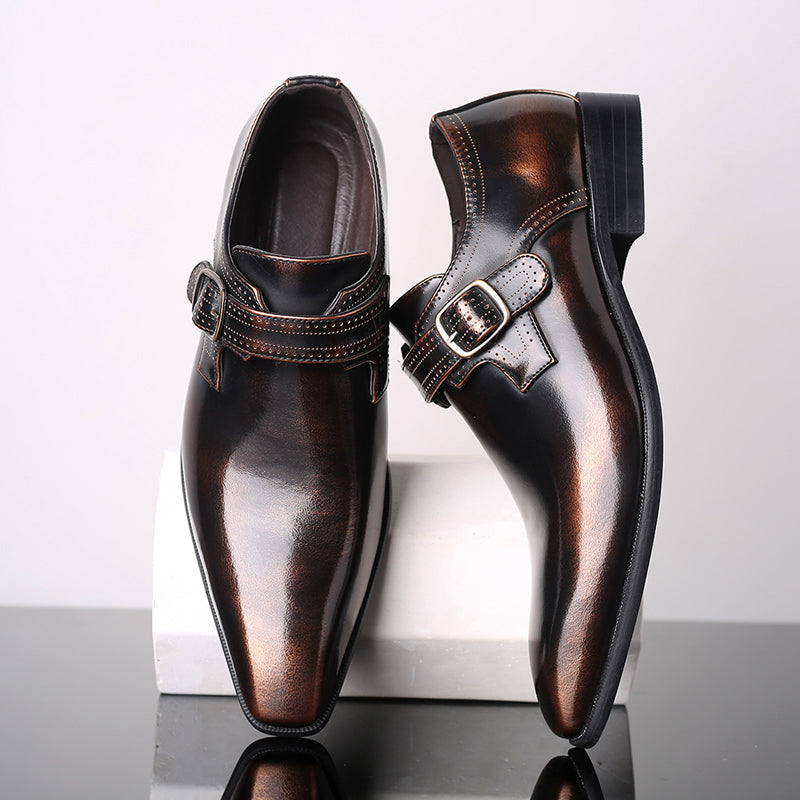 Men's polished black leather monk strap dress shoes, ideal for formal and business wear.