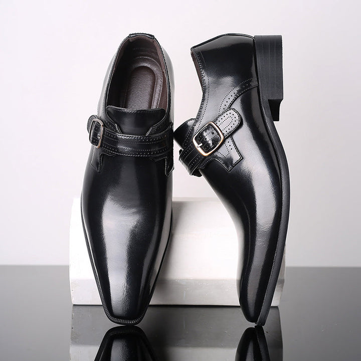 Sophisticated men's leather monk strap shoes in black, featuring a polished, high-shine finish for formal wear.