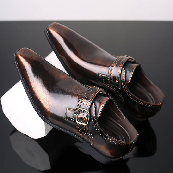 Stylish men's black formal monk strap dress shoes, polished for a sophisticated look in any business setting.
