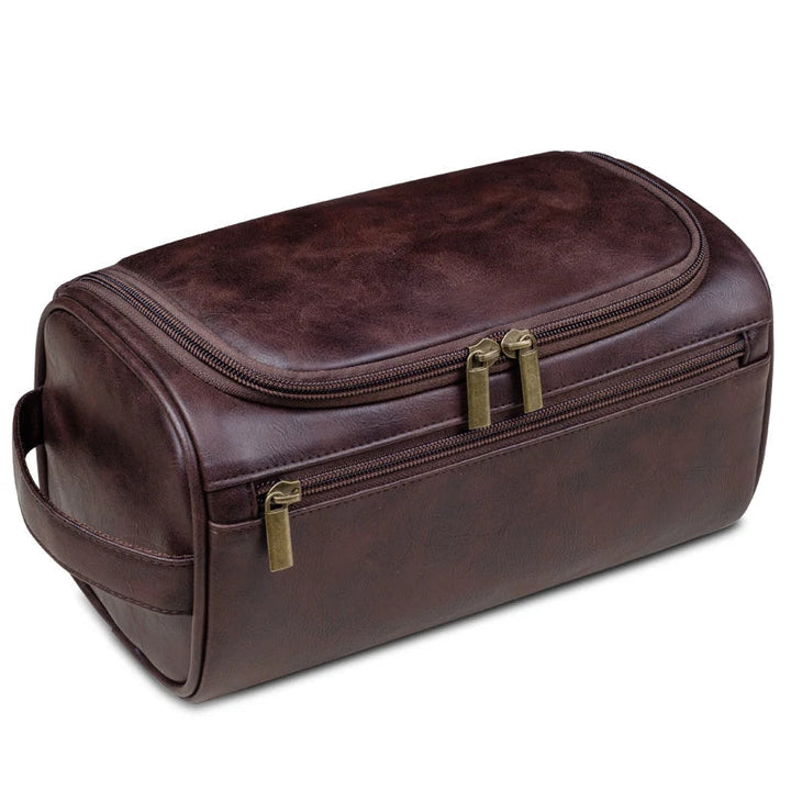 Stylish light brown men's travel dopp kit. Durable, waterproof toiletry bag for toiletries & grooming.