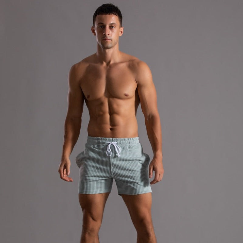 Stylish men's quick-dry beach shorts. Comfortable ripstop swimwear for pool, ocean, and travel.